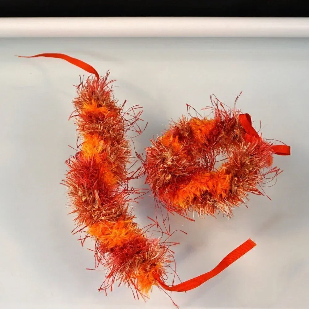 Kupee Wrist Lei Pair Red Orange Eyelash Yarn Tie-Ribbon